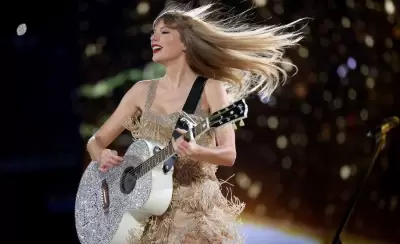 taylor-swift-rain-eras-tour-052223-3-6fcc02053cde4150b2f1bde3182fd9e8-jpg.